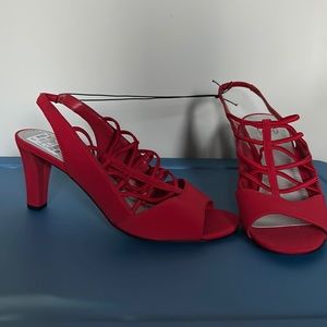 Ladies Red heels. Never worn. Size 8.5w.
